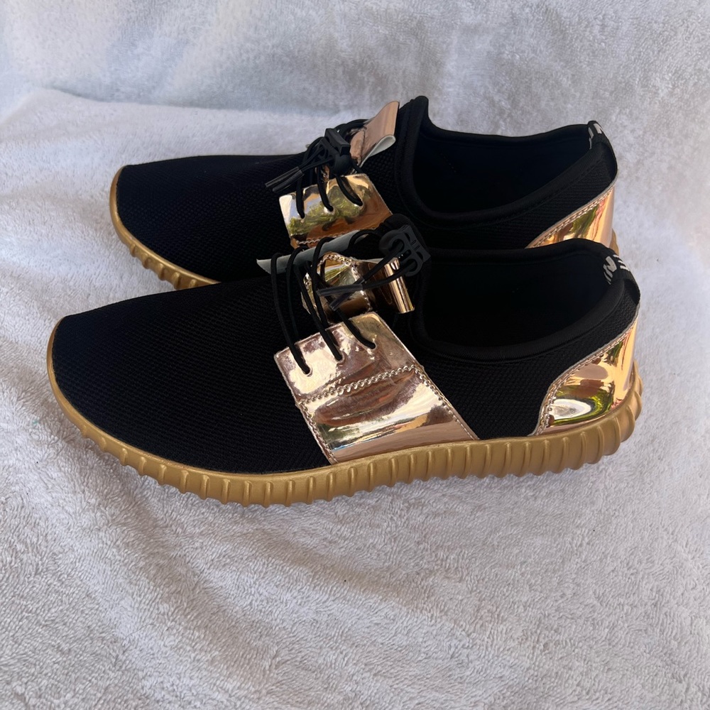 Black and rose gold sneakers